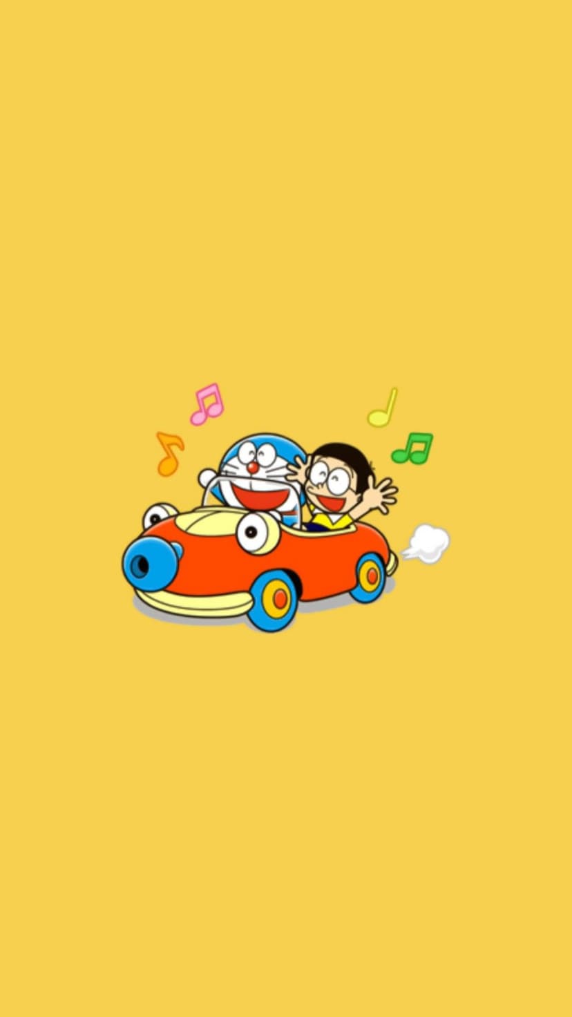 Doraemon and Nobita smile while driving a small red toy car surrounded by black musical notes on a yellow field.