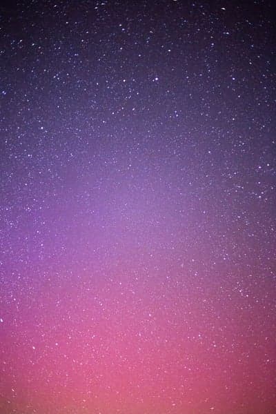 Purple and Pink Cosmic Nebula Gradient Starry Wallpaper