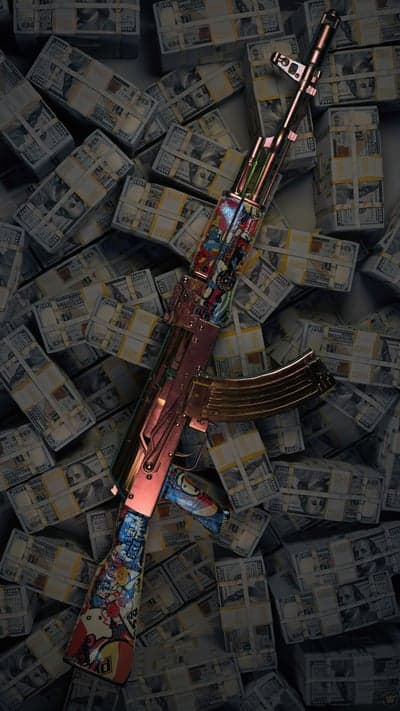 AK-47 gun adorned with anime stickers on stacks of money