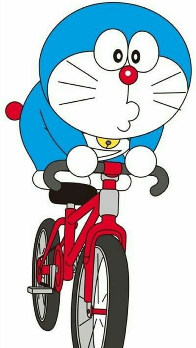Doraemon rides a red bicycle with a yellow bell, featuring his blue robotic body and a happy facial expression.