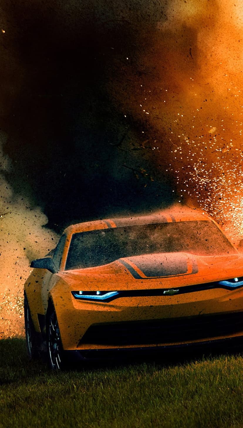 Orange muscle car amid a massive explosion with thick smoke and fiery embers on a vertical phone screen.