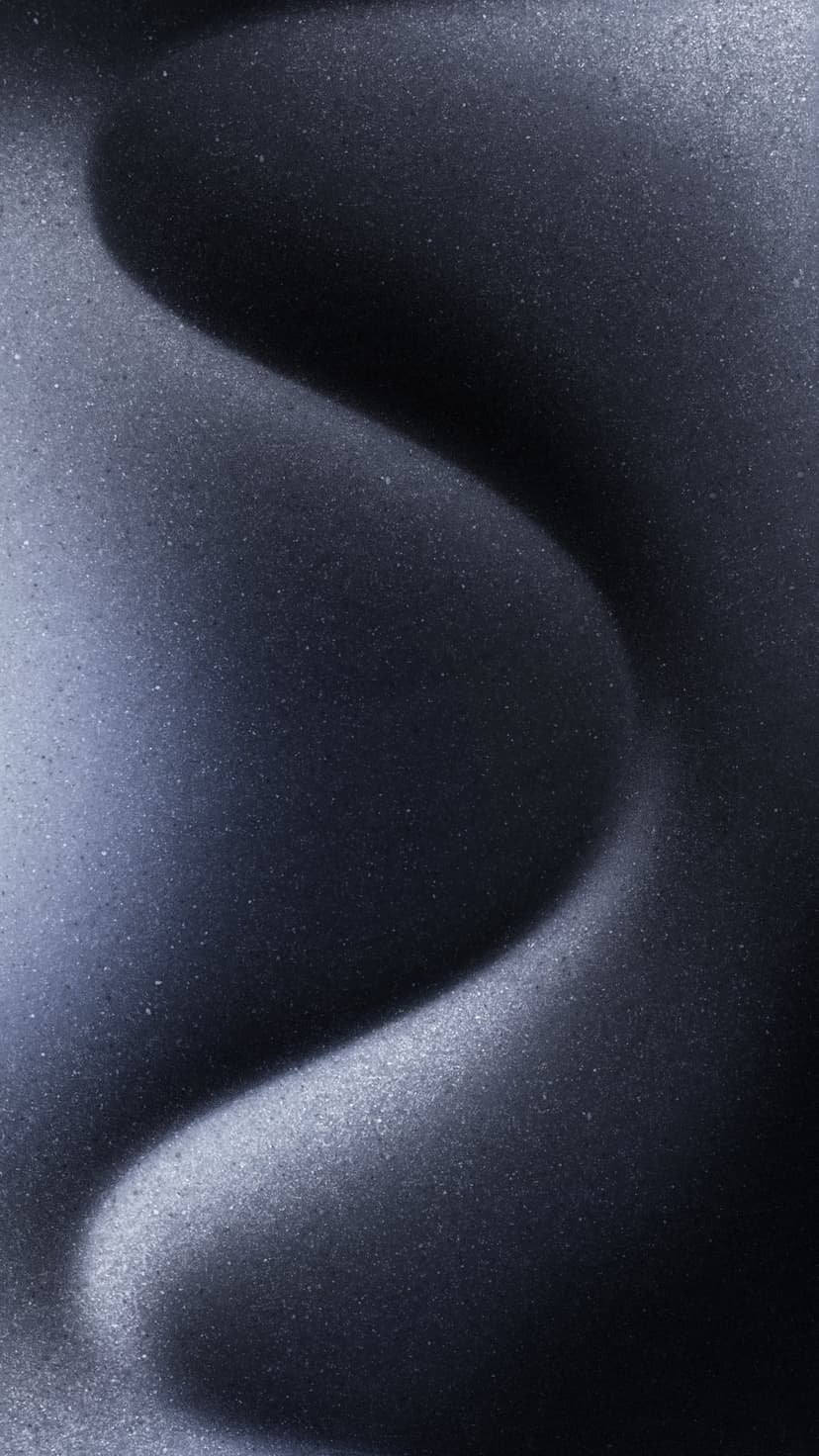Dark blue undulating waves with a grainy texture and soft light highlights flowing across a vertical surface.
