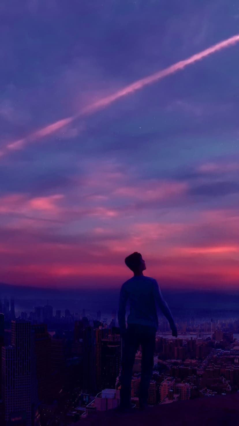 Silhouetted person looking at a purple and pink city skyline with a white contrail streaking across the dusk sky.
