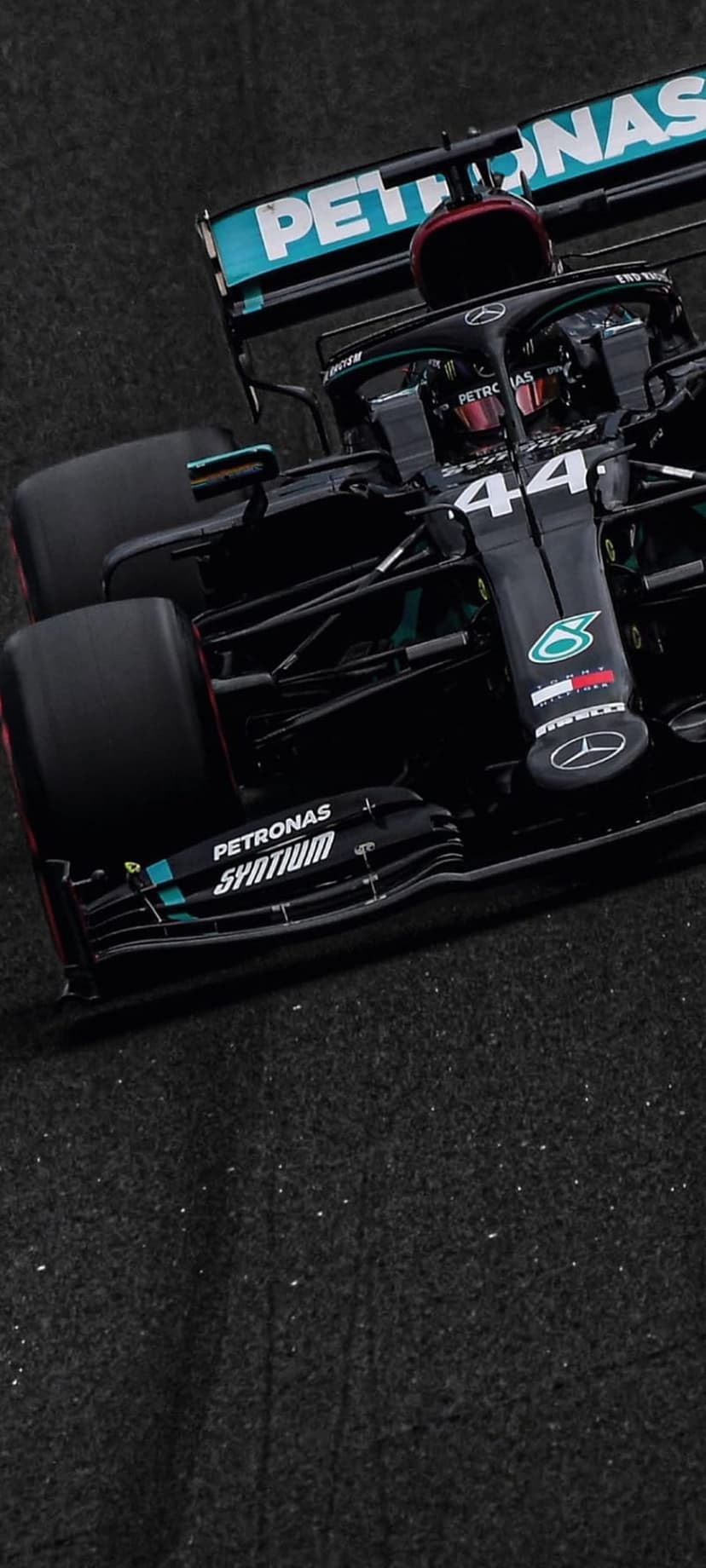 Mercedes-AMG W11 Formula 1 car features a detailed front wing and black livery on a high-speed track.