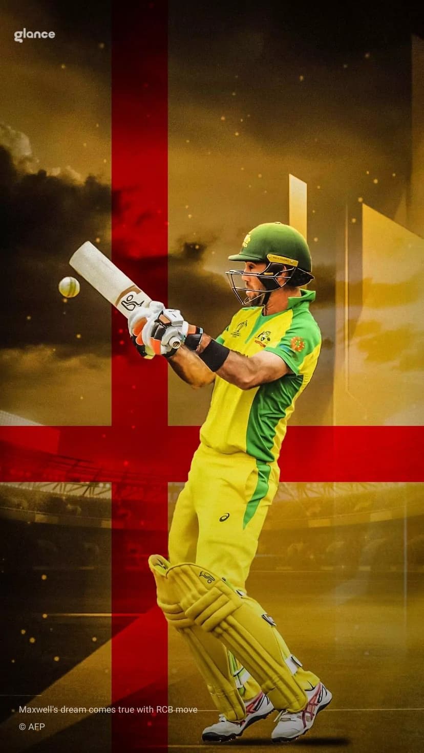 Male cricketer in a yellow uniform completes a batting swing against a red cross flag and cloudy sky background.