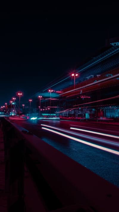 Nocturnal Commute - Light Trails on a Moody Highway