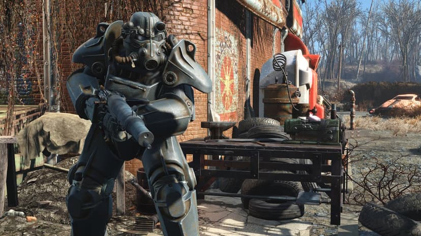 T-60 Power Armor soldier holding a submachine gun in front of a rusted red brick building and workbench.