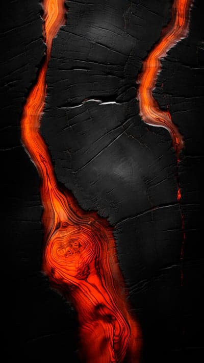 Glowing Lava Flow Through Cracked Black Texture