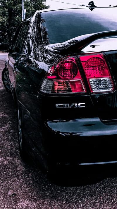 Black Honda Civic Rear View Sleek Phone Background