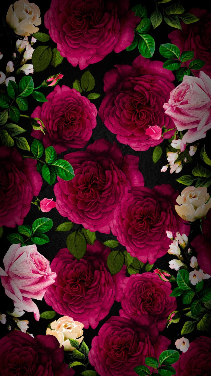 Deep burgundy and pink roses layered with cream blossoms and green leaves against a dark, shadowy background.