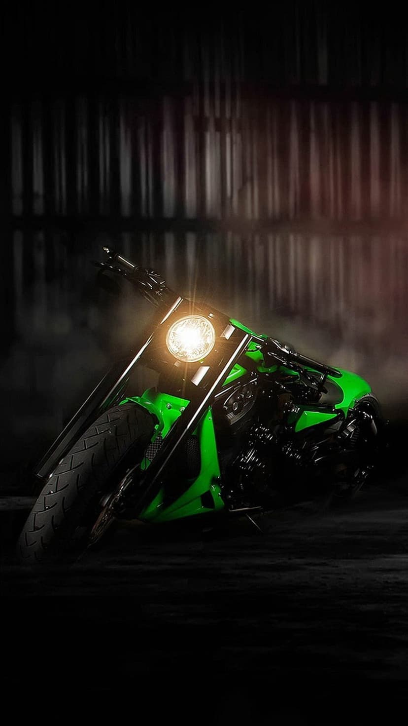 Lime green motorcycle with a glowing headlight parked in a dark, smoky garage with industrial ribbed walls.