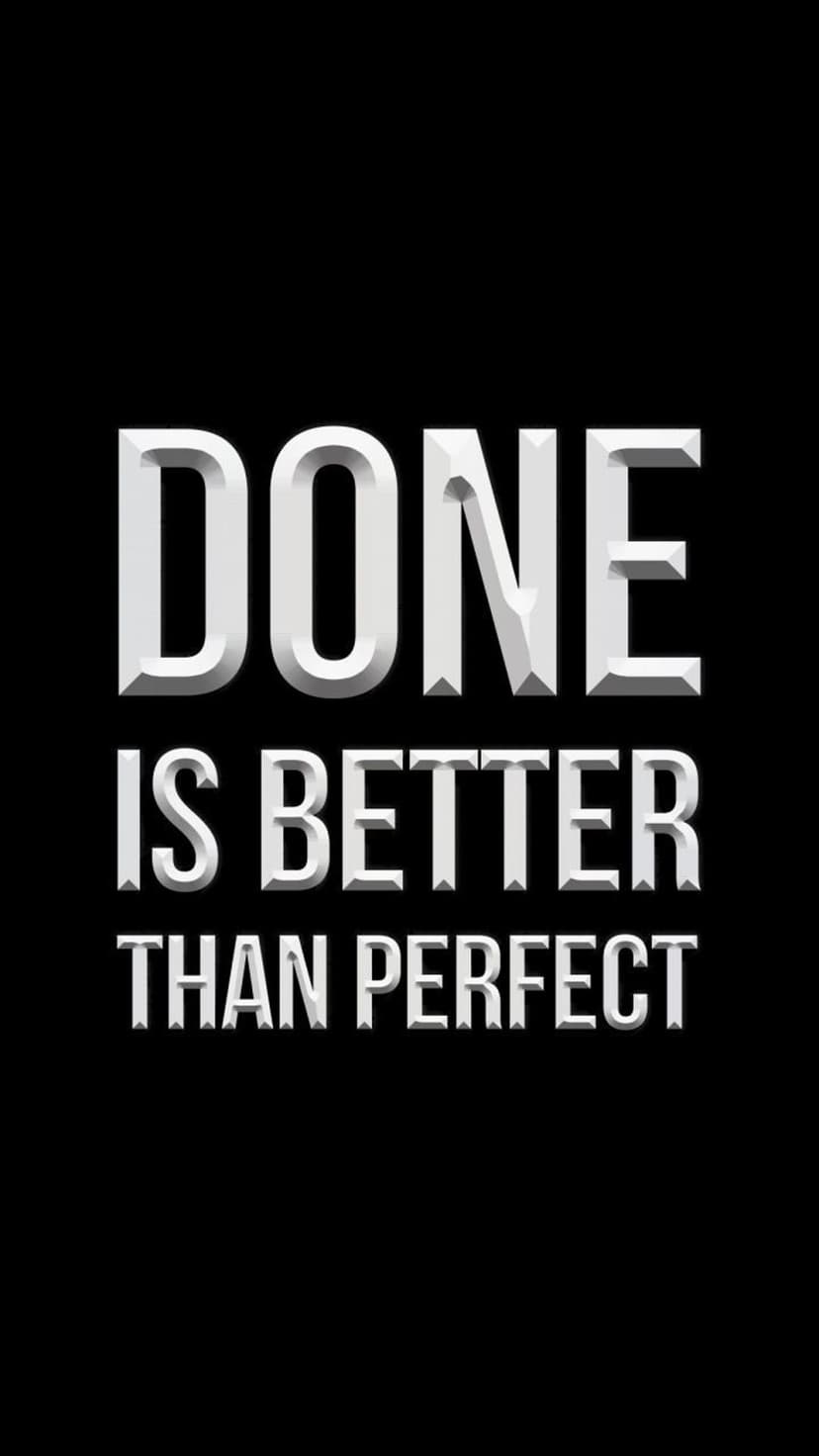 Bold 3D white typography spelling Done is Better Than Perfect against a dark, minimalist background.