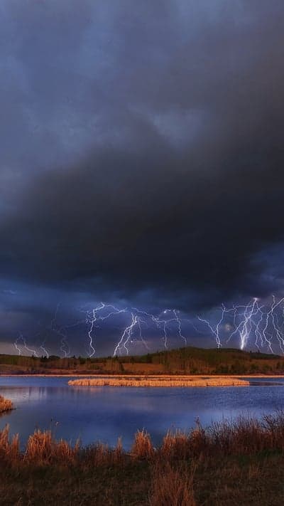 Celestial Fury Over Tranquil Waters