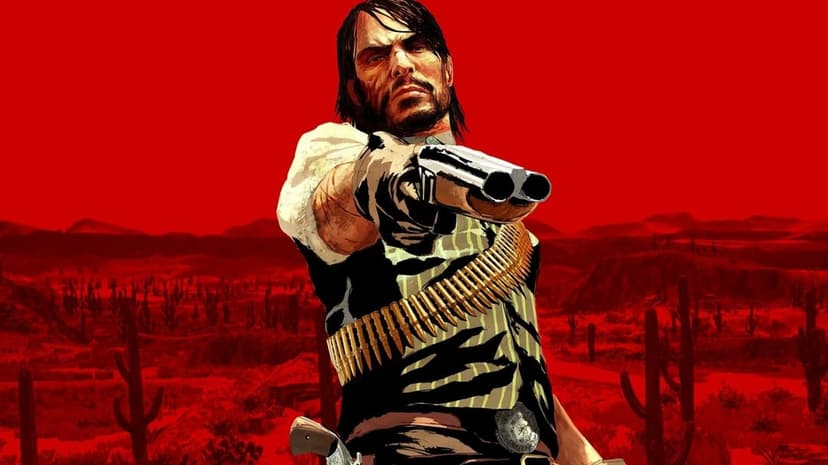John Marston aims a shotgun at the viewer against a vibrant red desert landscape with cactus silhouettes.