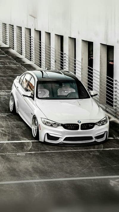 White BMW M4 Luxury Performance Coupe Mobile Wallpaper