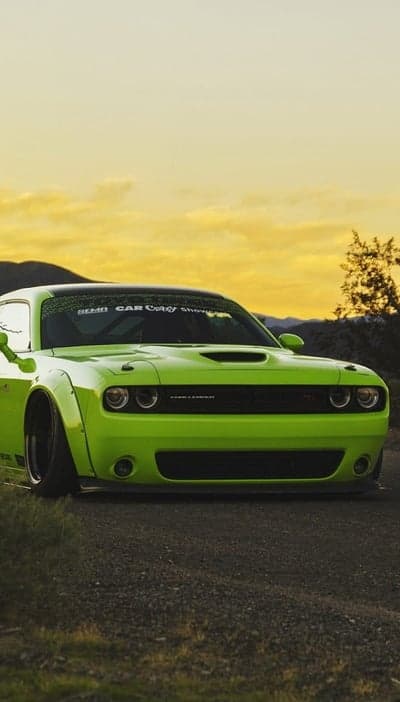 Lime Green Dodge Challenger at Sunset