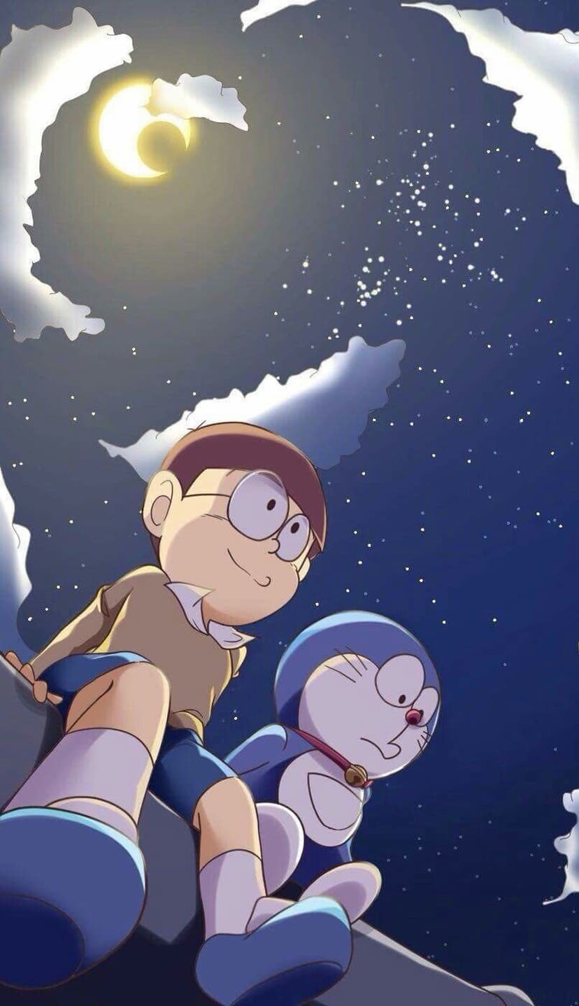 Nobita and Doraemon sit beneath a glowing crescent moon and swirling clouds in a starry purple night sky.