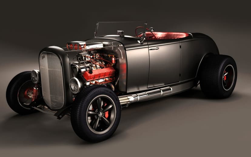 Matte black hot rod with an exposed red engine and chrome accents against a dark studio background.