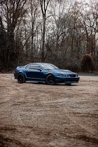 Modified Blue Ford Mustang GT Forest Path Phone Wallpaper