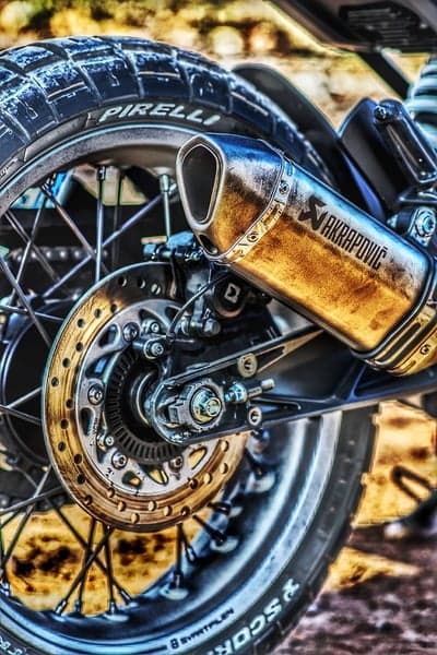High-Performance Sportbike Wheel and Exhaust Wallpaper