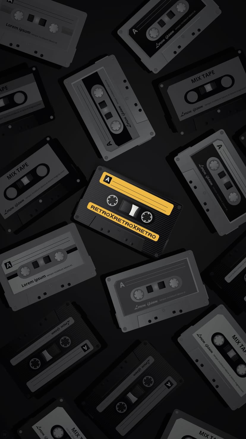 Stacked vintage cassette tapes with handwritten labels and one bright yellow tape in a dark music collection.
