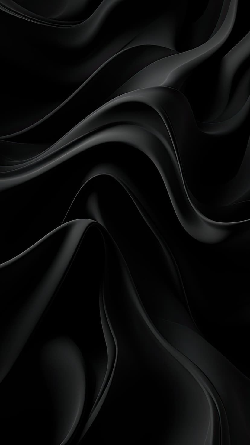 Flowing black fabric ripples with soft highlights and deep shadows create a textured vertical abstract pattern.