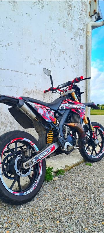 Custom Red & Black Dirt Bike with Unique Graphics