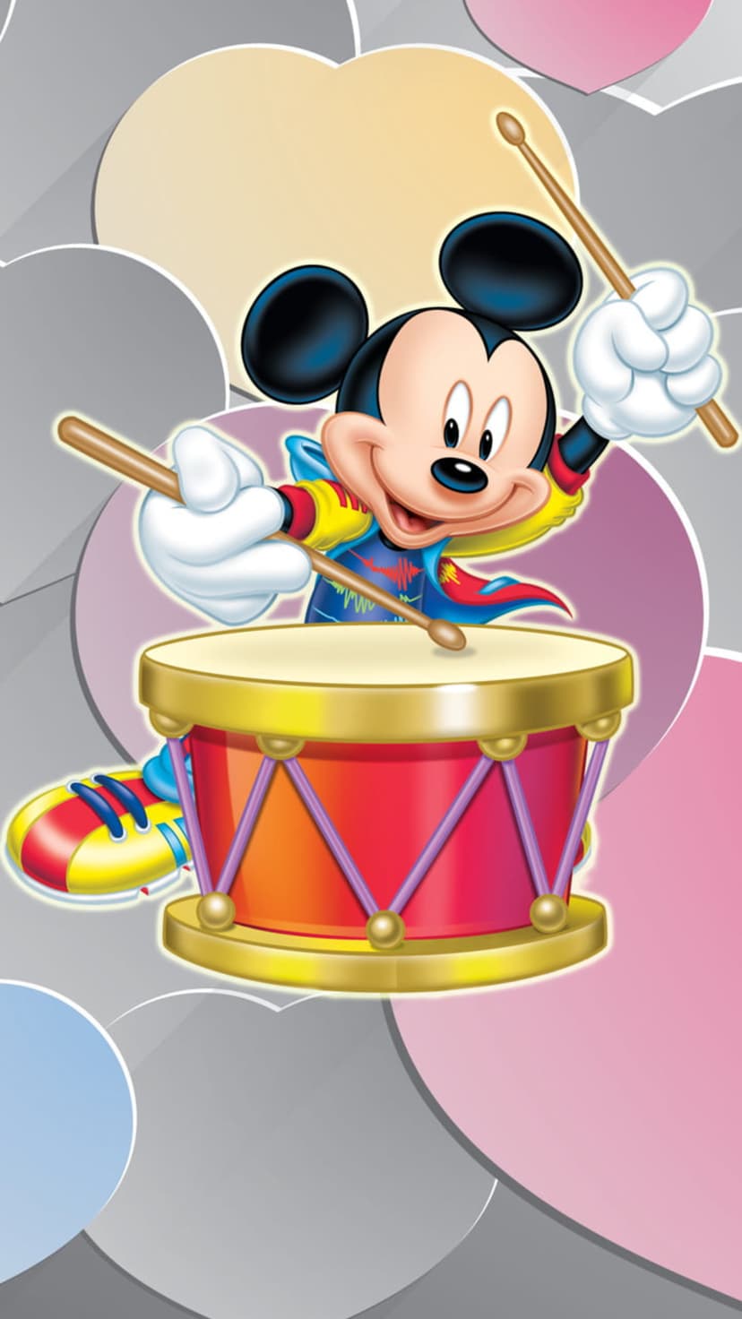 Mickey Mouse smiles while drumming with sticks on a striped drum surrounded by soft gray and pastel circular shapes.