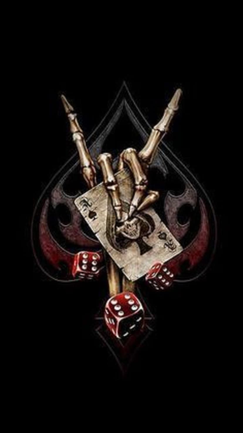 Skeletal hand making a rock gesture while holding an Ace of Spades card surrounded by several red gambling dice.