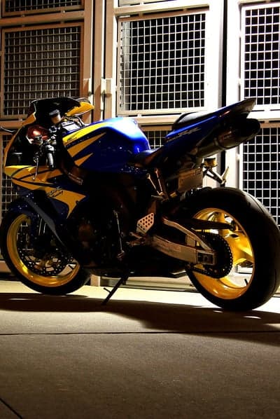 Blue and Yellow Sportbike Motorcycle with Gold Wheels