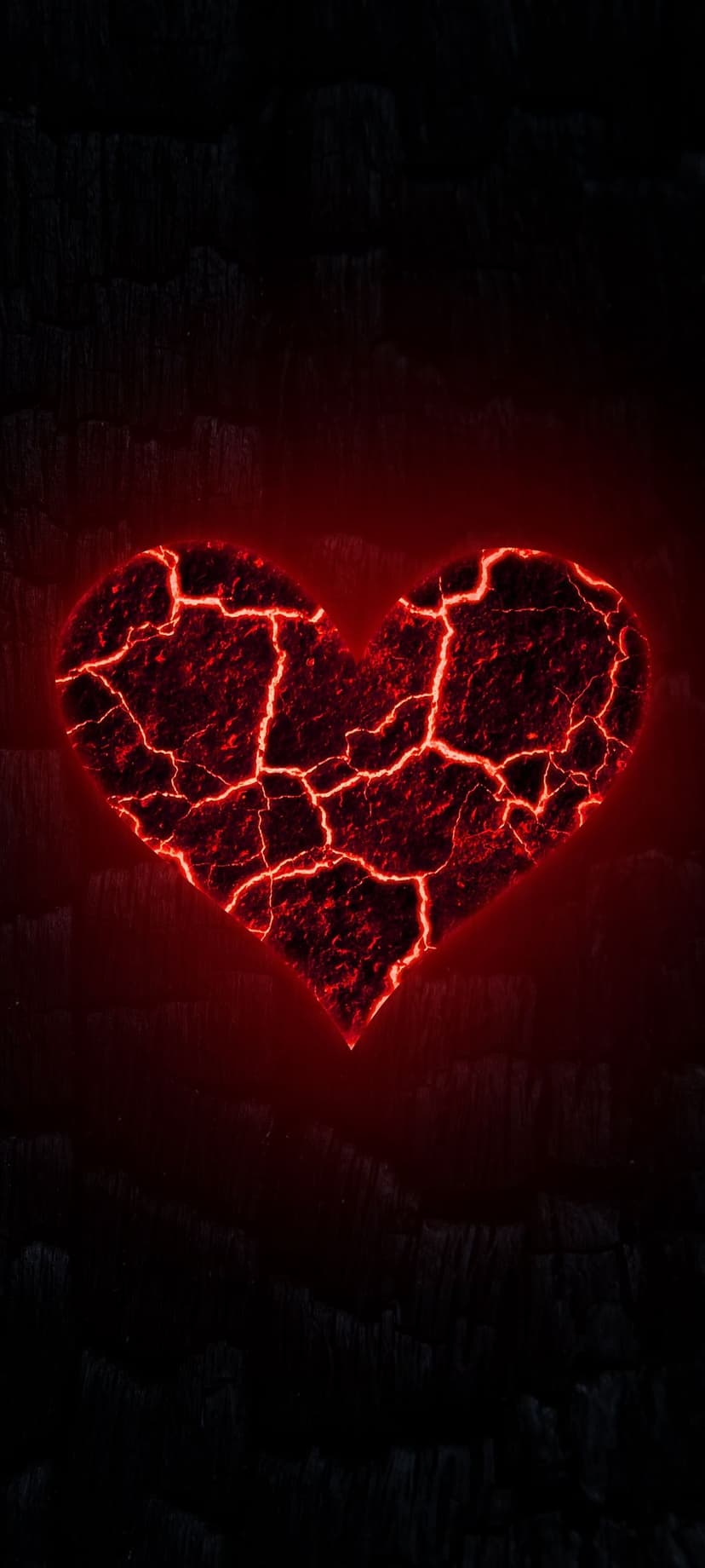 Heart shape formed by glowing red lava cracks inside dark volcanic rock against a black textured background.