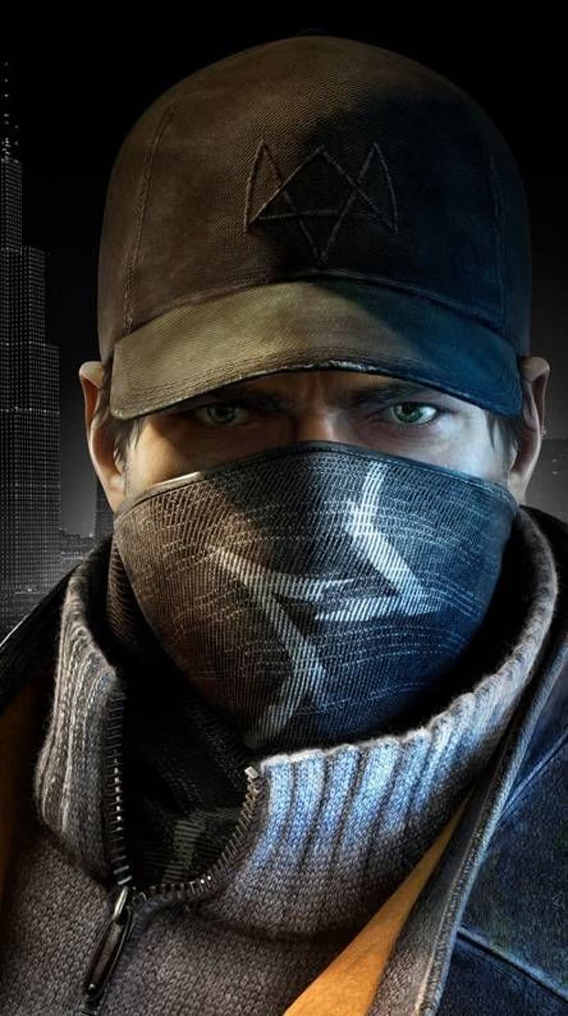 Aiden Pearce stares forward with green eyes while wearing a black cap and blue patterned bandana in a city at night.