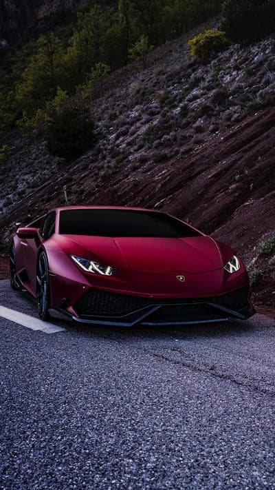 Red Lamborghini Mountain Road Twilight Phone Wallpaper
