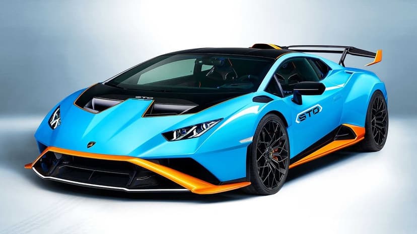 Light blue Lamborghini Huracán STO with orange accents and black carbon fiber in a white studio setting.