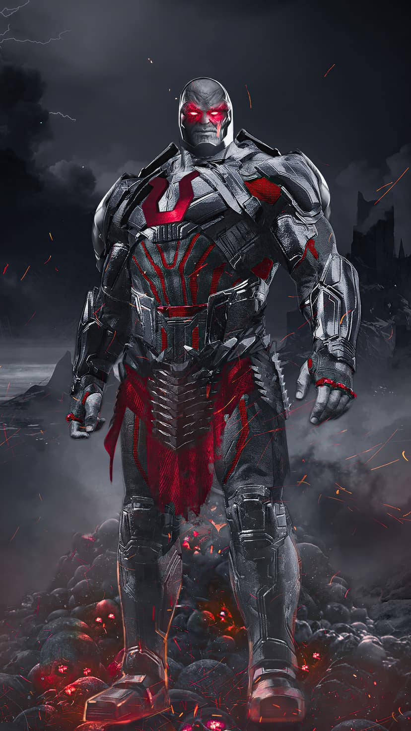 Darkseid in spiked metallic armor with glowing red eyes stands on a desolate volcanic landscape under a dark sky.