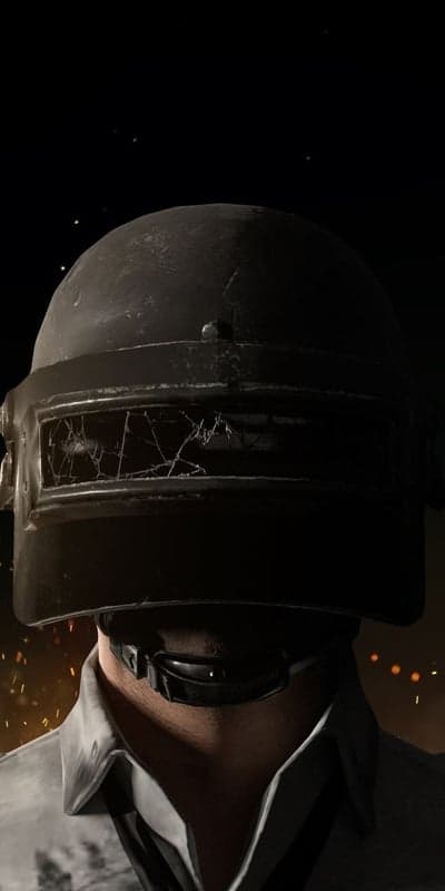 Man in Cracked PUBG Helmet with Fiery Background