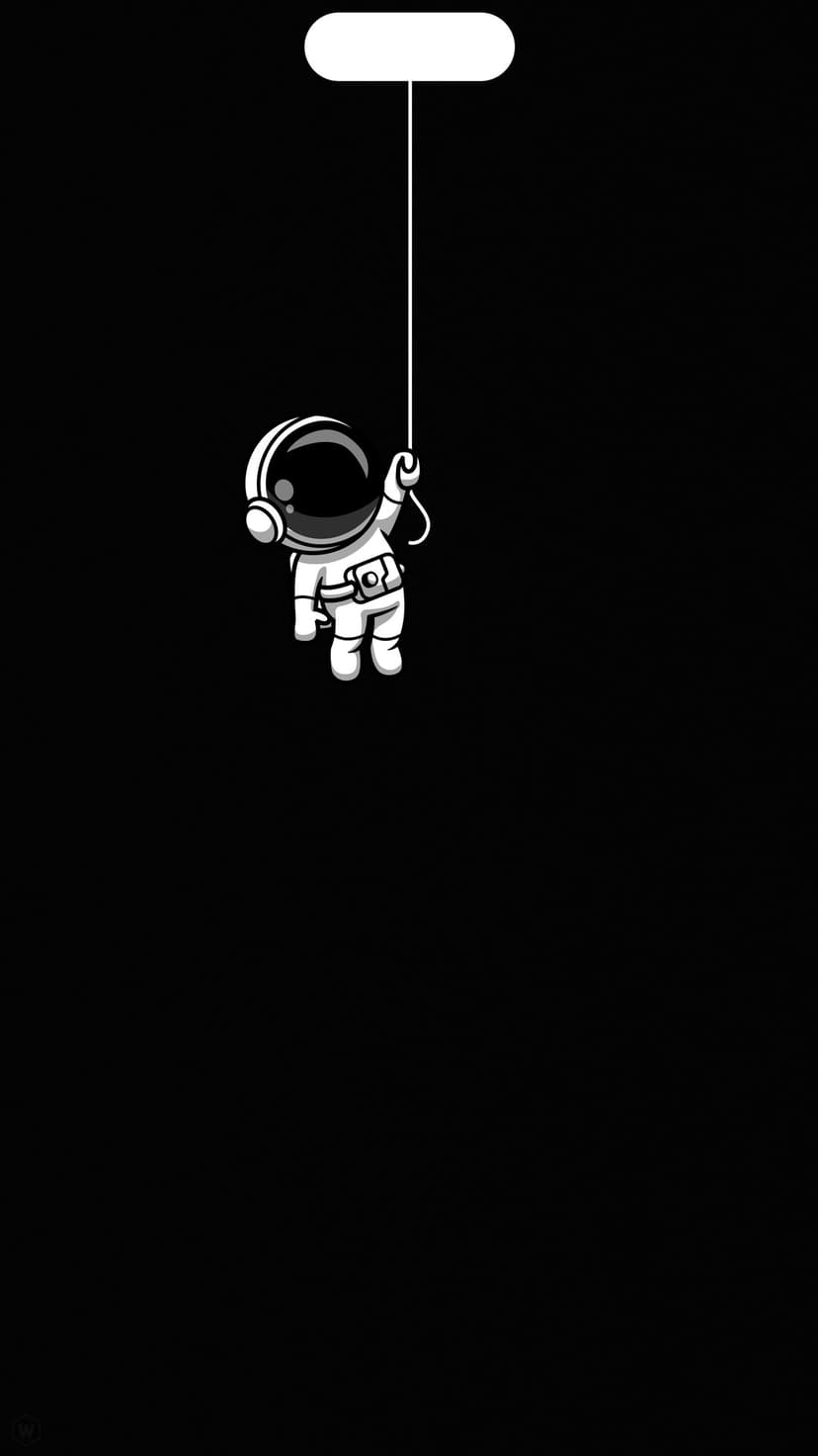 Small white astronaut dangling from a round balloon against a solid black backdrop with a reflective glass helmet.