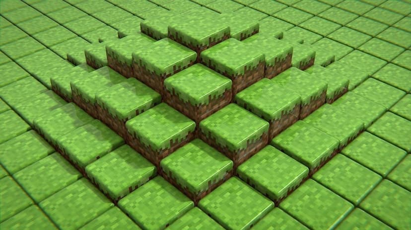Isometric view of a 3D pyramid made of glossy green Minecraft-style grass blocks with soft shadows.