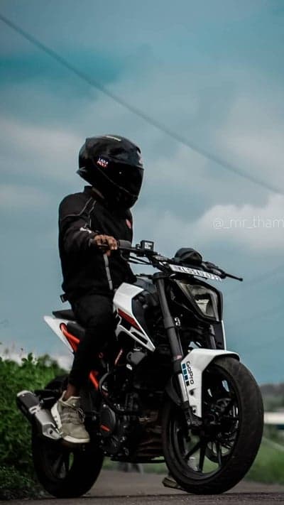 Rider in Black Gear on KTM Duke Motorcycle