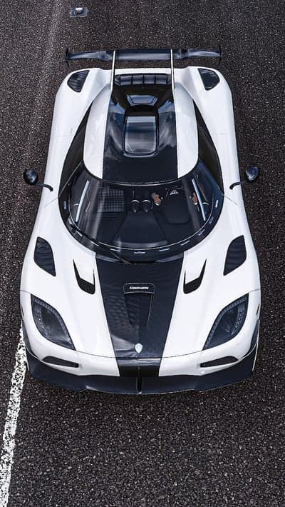 White Koenigsegg Hypercar Aerial View Tablet Wallpaper