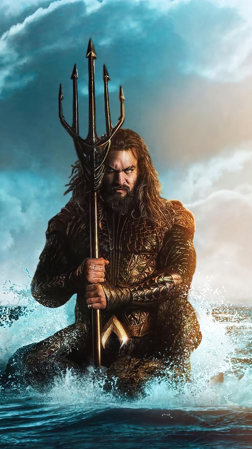 Aquaman grips a golden trident while submerged in swirling blue ocean waves with a dark cinematic sky.