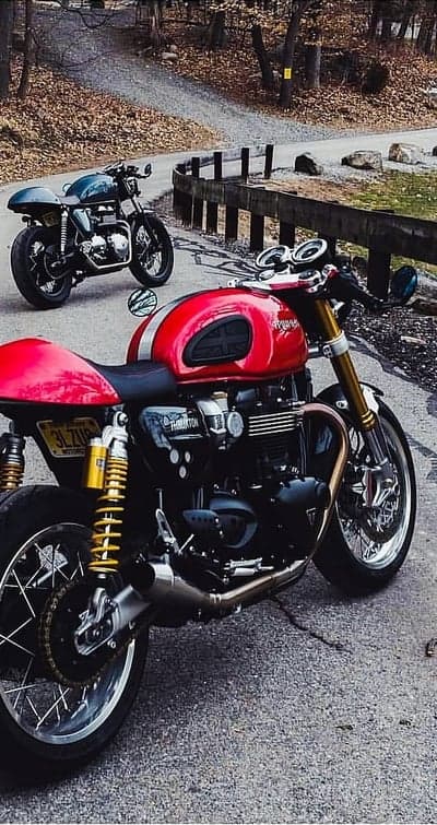 Vintage Triumph Motorcycles on a Winding Road