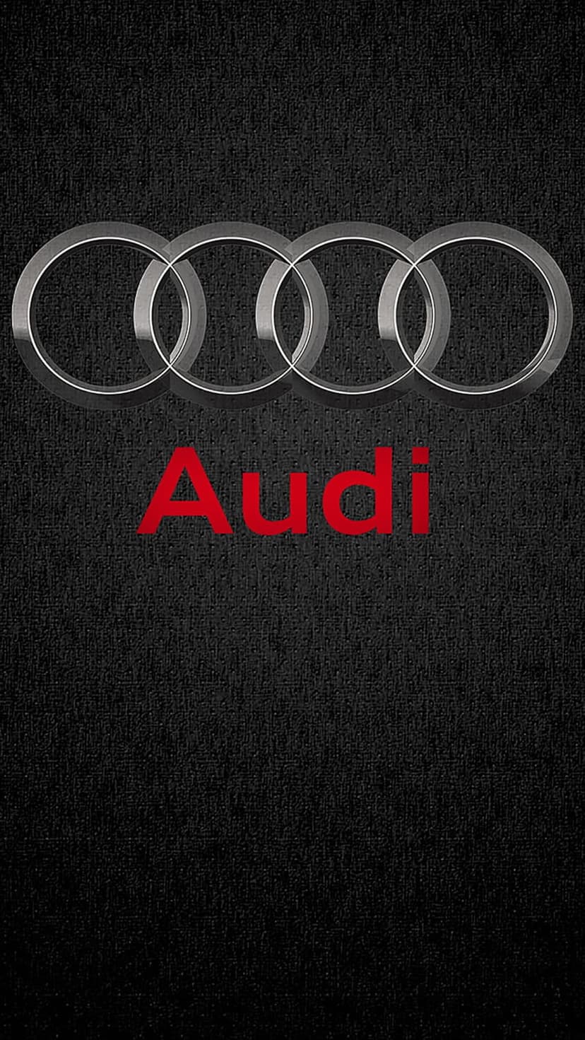 Audi silver interlocking rings logo positioned above red text on a black textured carbon-style background.
