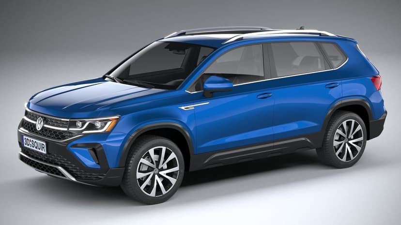 Blue Volkswagen Taos SUV with silver roof rails parked in a clean gray studio with soft floor reflections.