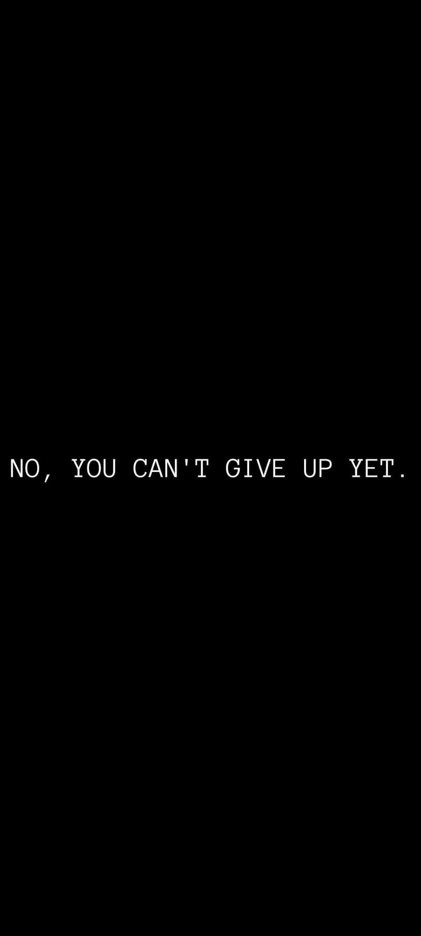 White capital letters spelling No You Cant Give Up Yet centered on a solid matte black vertical background.