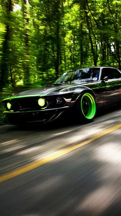 Black Mustang Neon Green Accents Speeding Mobile Wallpaper
