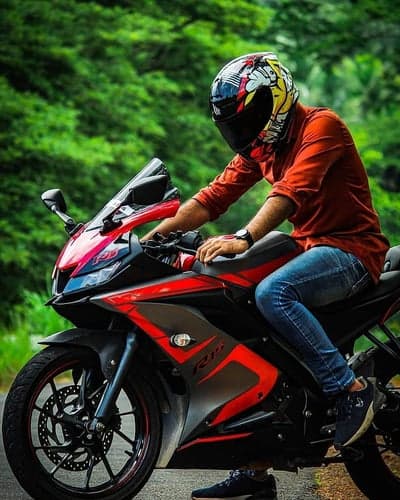 Biker in Red Shirt on Sport Motorcycle Phone Background