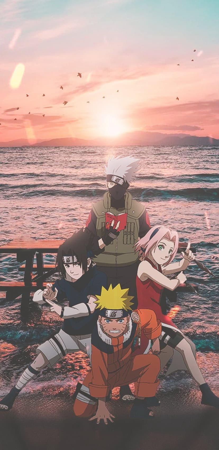 Naruto, Sasuke, Sakura, and Kakashi pose on a beach as the sun sets over ocean waves with orange sky.