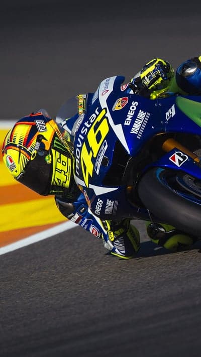 Valentino Rossi MotoGP Rider Leans into Corner on Yamaha