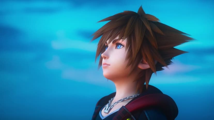 Sora from Kingdom Hearts looking up against a blue sky, highlighting spiky brown hair and bright blue eyes.